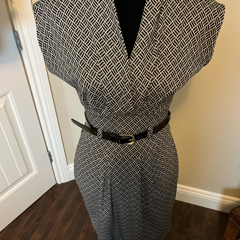 2/$20 item. Black and white patterned dress with belt. Flattering fit. Sz med.